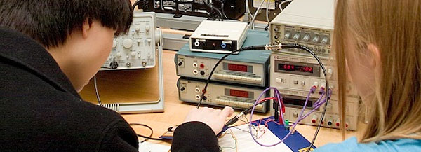 Electrical engineering students work on a project.