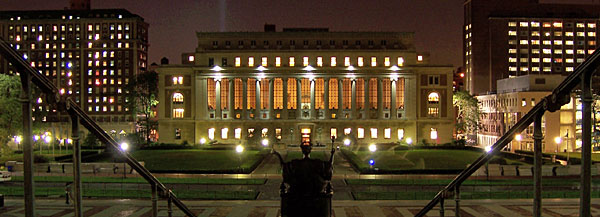 The lights of Low Plaza illuminate the night.
