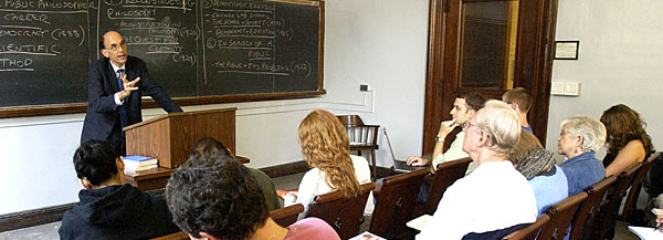 Professor Casey Nelson Blake in class with his students.